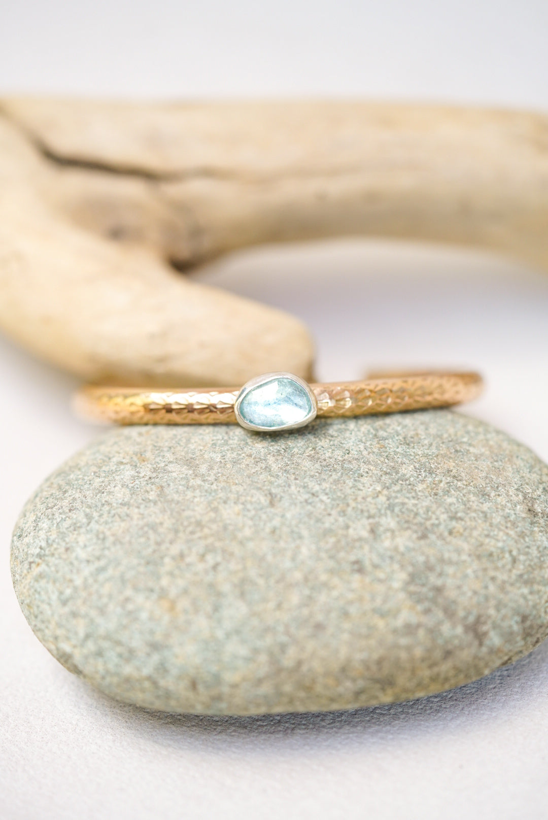 gold stamped cuff with aquamarine