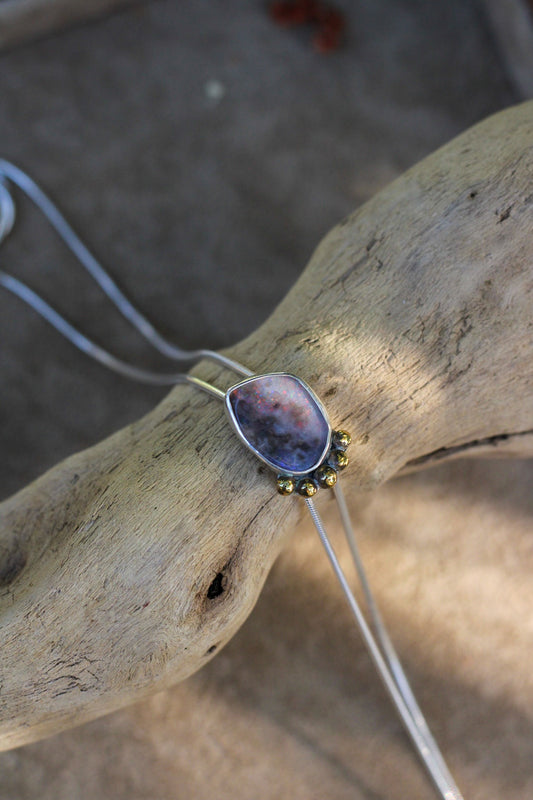 Bolo style necklace with a Australian Opal stone pendant on a piece of driftwood.